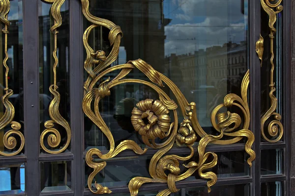 Golden metal pattern on the window