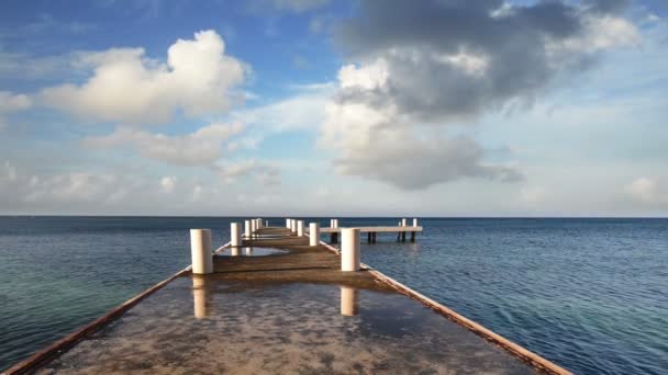 Morning pier stretching into the horizon of the Caribbean — Stock Video