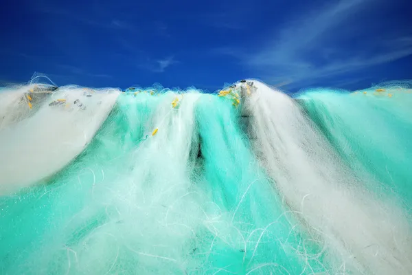 Pêcheurs le réseau sur le fond de bleu du ciel . — Photo