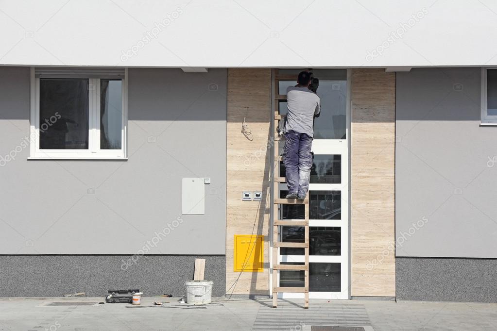 Worker on a ladder