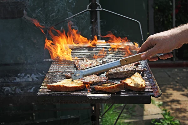 Grill with flames — Stock Photo, Image