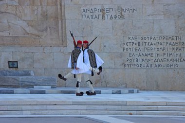 Athens, Greek - August 28: 2022: Change of Guard at the in front of the parliament, Monument of the Unknown Soldier at Syntagma Square the central square of Athens.