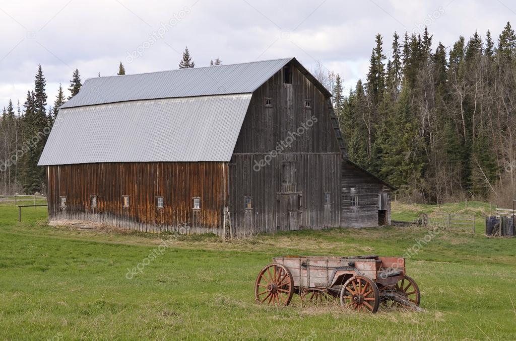 Old barn and drawn wagon