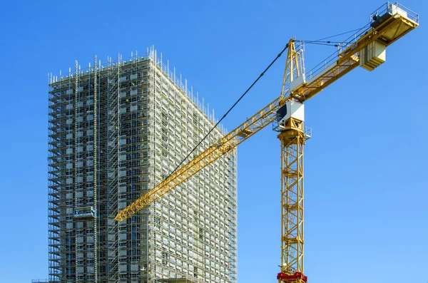 Building construction site with crane — Stock Photo, Image