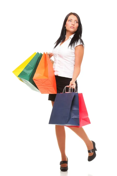 Comprimento total de feliz jovem senhora sacos de compras contra isolado — Fotografia de Stock