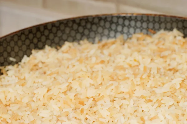 Skillet with rice — Stock Photo, Image