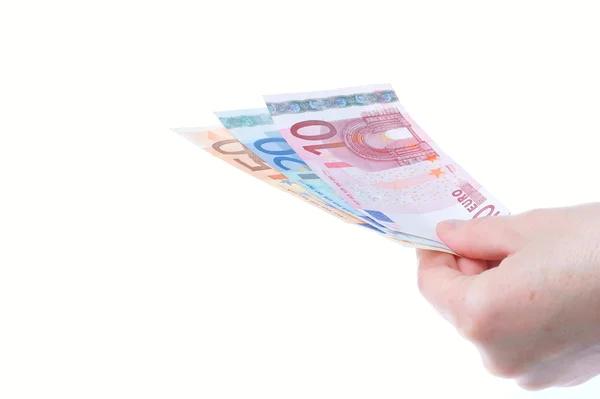 Mano de mujer y efectivo en euros — Foto de Stock