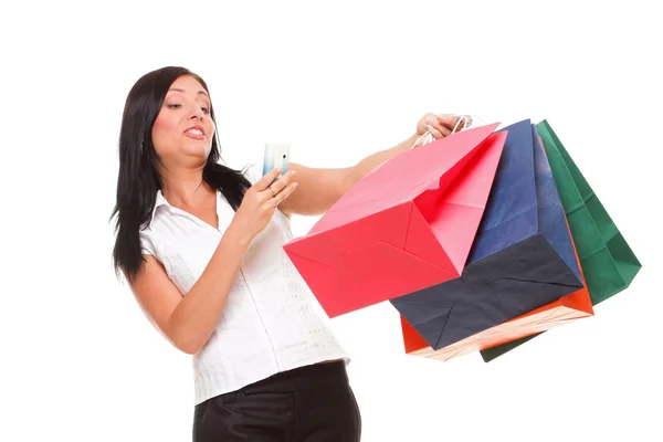 Portrait cute young woman mobile phone while holding shopping ba — Stock Photo, Image