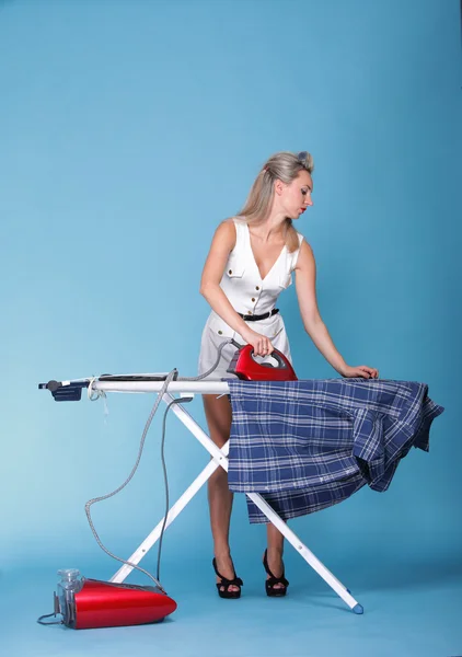 Pin up girl retro style portrait woman ironing — Stock Photo, Image