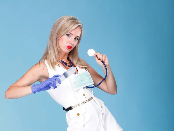 Sexuella kvinnan i sjuksköterska kostym med stetoskop blå — Stockfoto