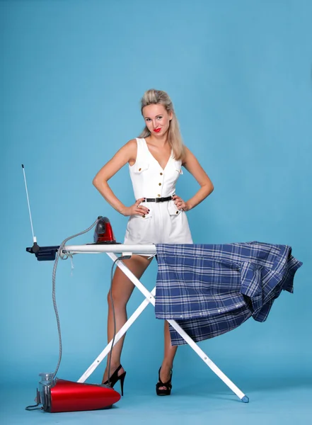 Pin up girl retro style portrait woman ironing — Stock Photo, Image