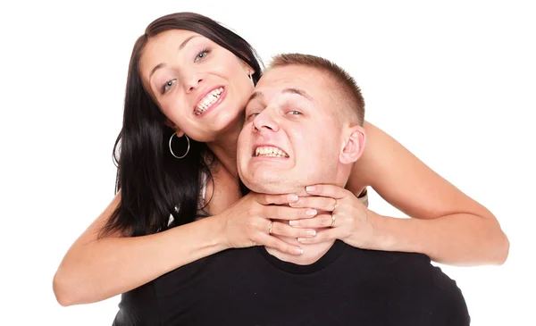 Loving embracing Portrait of a beautiful young happy smiling couple isolated — Stock Photo, Image