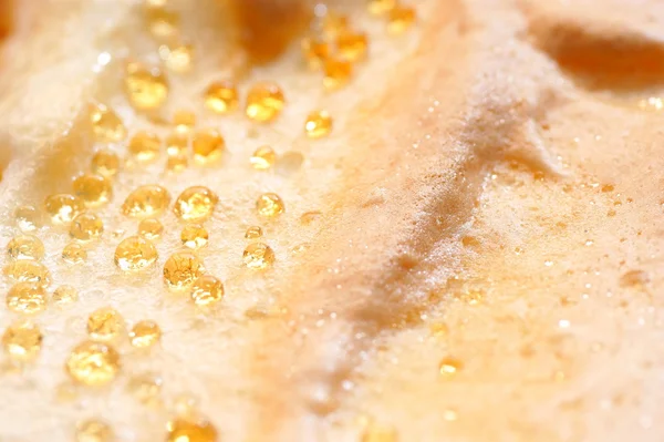 Złota makro krople na sernik — Zdjęcie stockowe