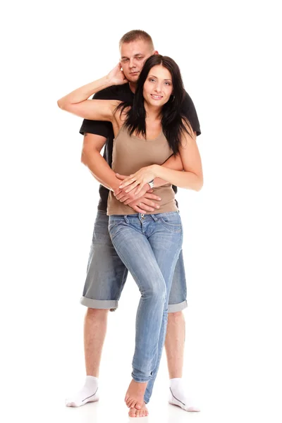 Portrait d'un beau jeune couple heureux et souriant isolé — Photo