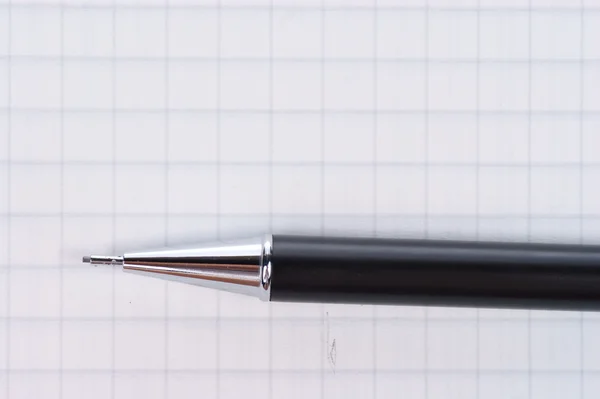 Empty page of notebook and black pencil — Stock Photo, Image