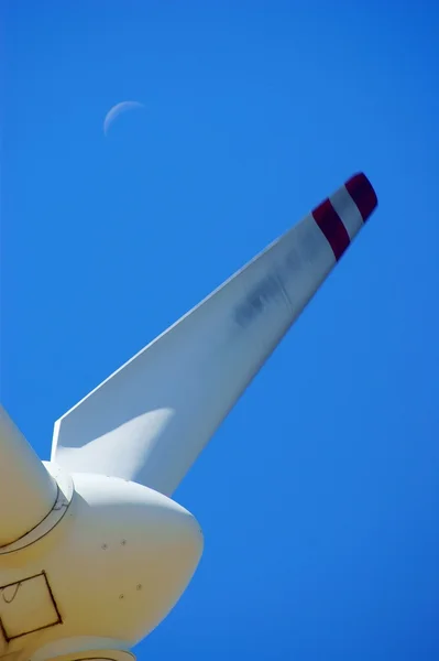 Wind power - turbine installation with blue sky and moon — Stock Photo, Image