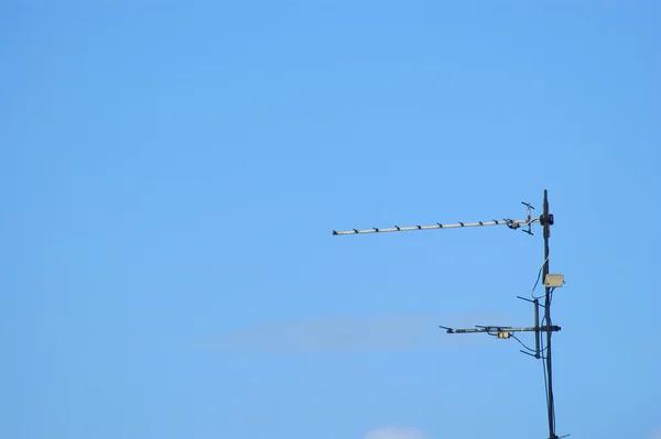 Antenna on blue sky — Stock Photo, Image