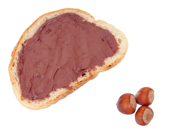 Hazelnut and bread with chocolate cream — Stock Photo, Image