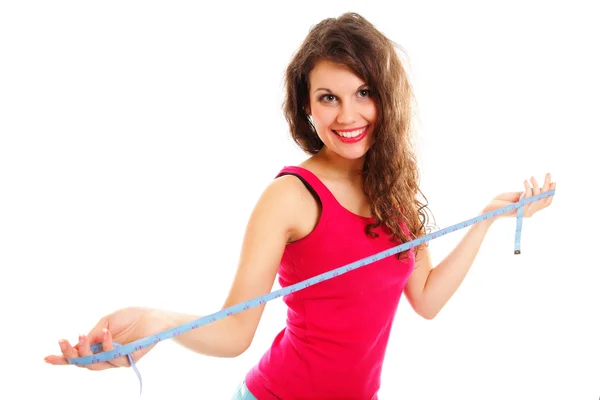 Young beautiful woman with measure tape — Stock Photo, Image