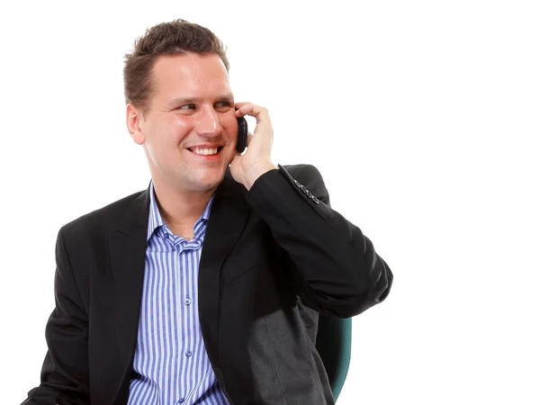 Confident man speaking on his mobile and smiling — Stock Photo, Image