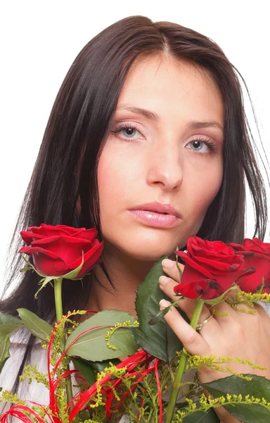 Closeup portrait of attractive young woman holding a red rose — Stock Photo, Image