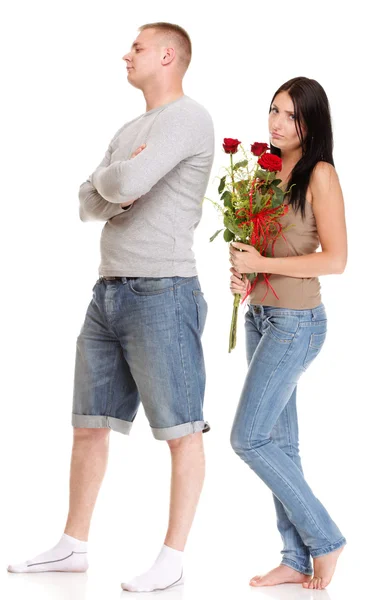 Attractive young couple gift rose in hand isolated — Stock Photo, Image