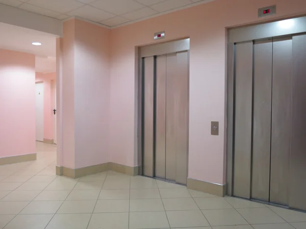 Two closed elevators in a business lobby — Stock Photo, Image