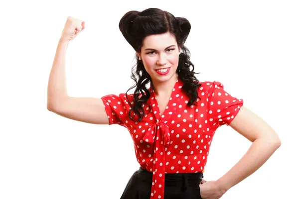 Cheerful pin up woman flexing biceps isolated — Stock Photo, Image