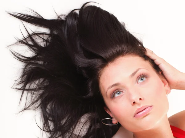 Latin woman in red lying on the floor white — Stock Photo, Image