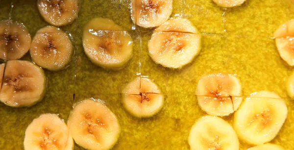 De cake van de gelei van het fruit met babana als achtergrond — Stockfoto