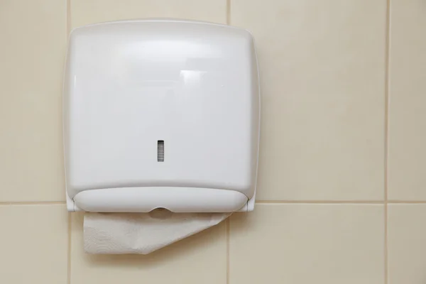 Paper towel dispenser in the bathroom — Stock Photo, Image