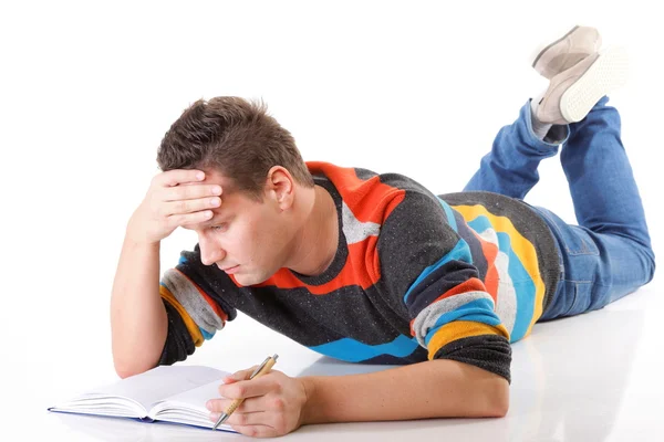 Estudiante universitario cansado después de duro trabajo para el examen —  Fotos de Stock