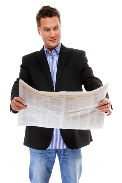 Empresario leyendo un periódico aislado — Foto de Stock