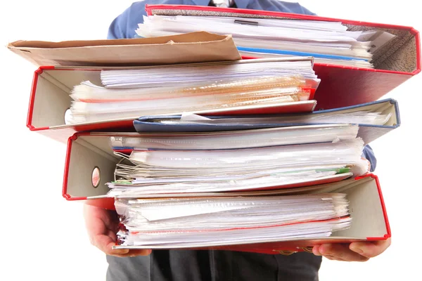 Male office worker carrying a stack of files — Stock Photo, Image