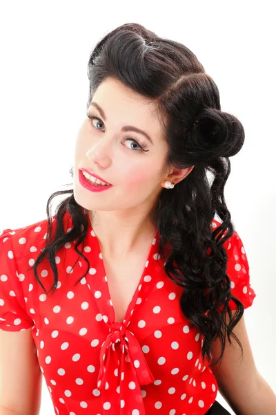 Woman pin-up make-up hairstyle posing in studio Royalty Free Stock Images