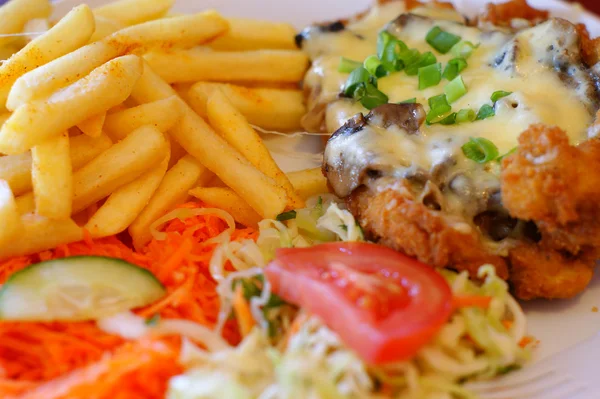 Chicken steak with fries - chips and salad — Stock Photo, Image