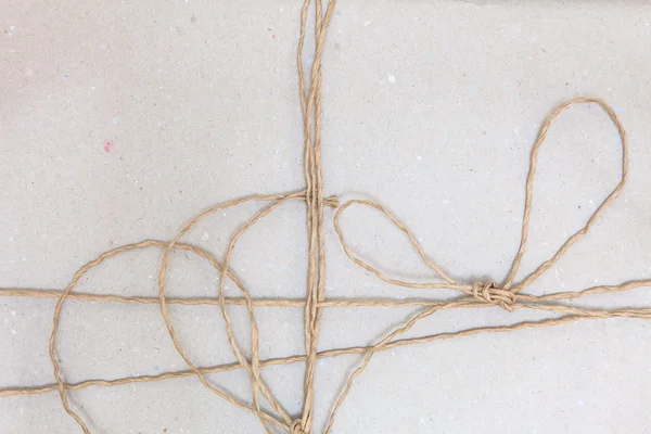 Reciclar la textura del papel con envoltura de cuerda — Foto de Stock