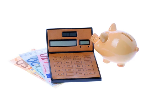 Piggy bank, calculator and euro currency — Stock Photo, Image
