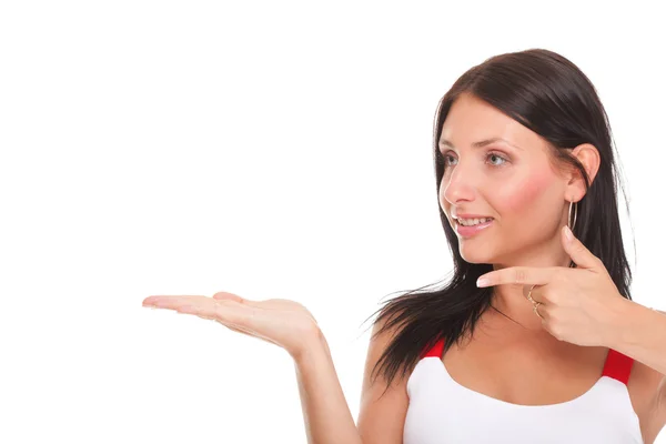 Young woman showing product open hand palm excited expression — Stock Photo, Image