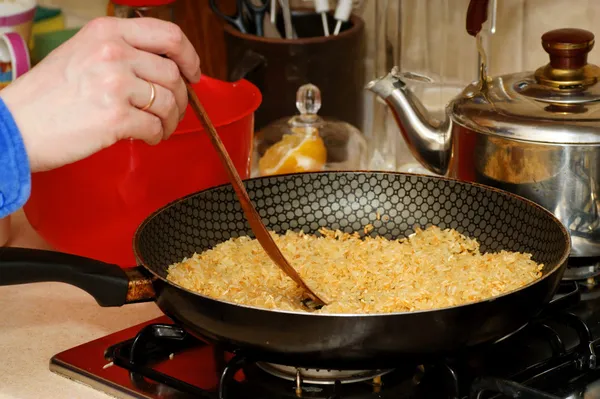 Skillet with rice — Stock Photo, Image