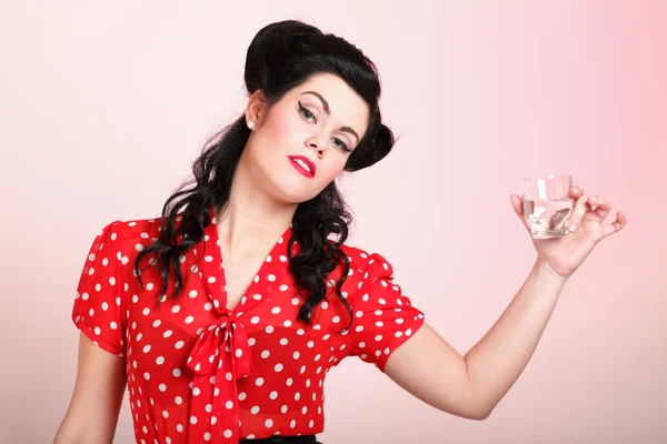 Young woman retro style drinking water — Stock Photo, Image