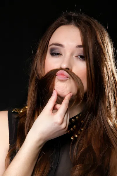 Grimacing. Girl hair moustaches making silly face — Stock Photo, Image