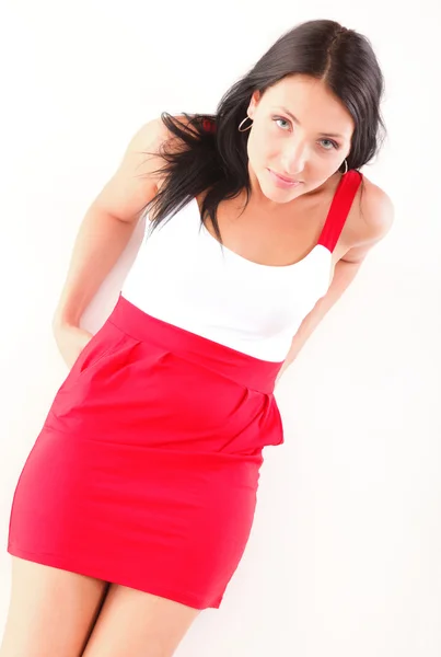 Latin woman in red lying on the floor white — Stock Photo, Image