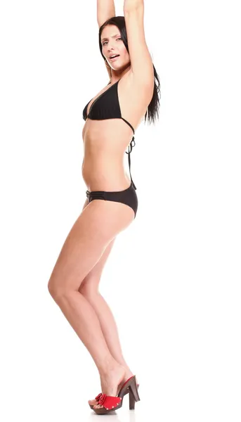Portret seksowny brunetka w bikini brązowy na białym tle — Zdjęcie stockowe