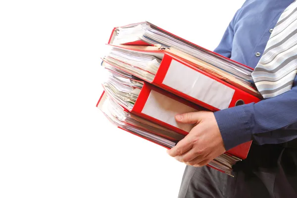 Male office worker carrying a stack of files — Stock Photo, Image