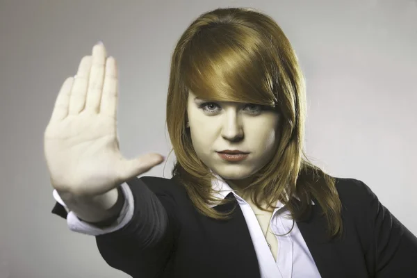 Young woman making stop gesture sign — Stock Photo, Image