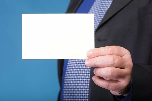 Close up of business note card in male hand — Stock Photo, Image