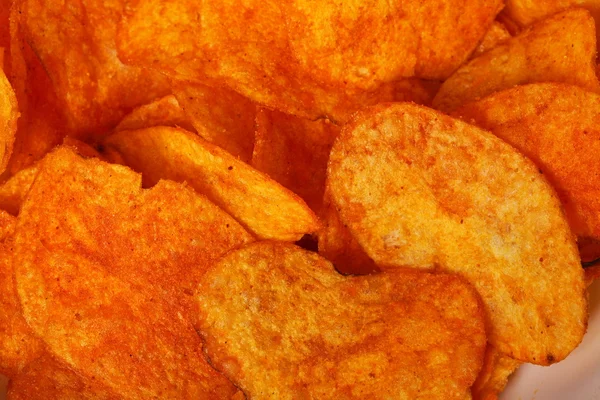 Close up potato paprika chips as background — Stock Photo, Image