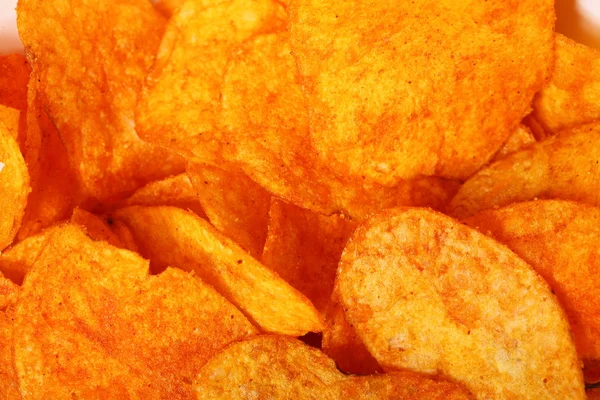 Close up potato paprika chips as background — Stock Photo, Image