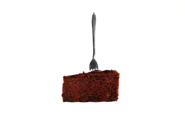 Piece of chocolate cake with fork isolated — Stock Photo, Image